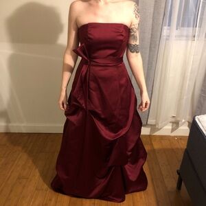 Burgundy strapless maxi formal dressing gown with ruffle detail and bow detail